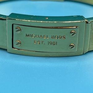 MK Gokd-Tone Engraved Plaque Bangle